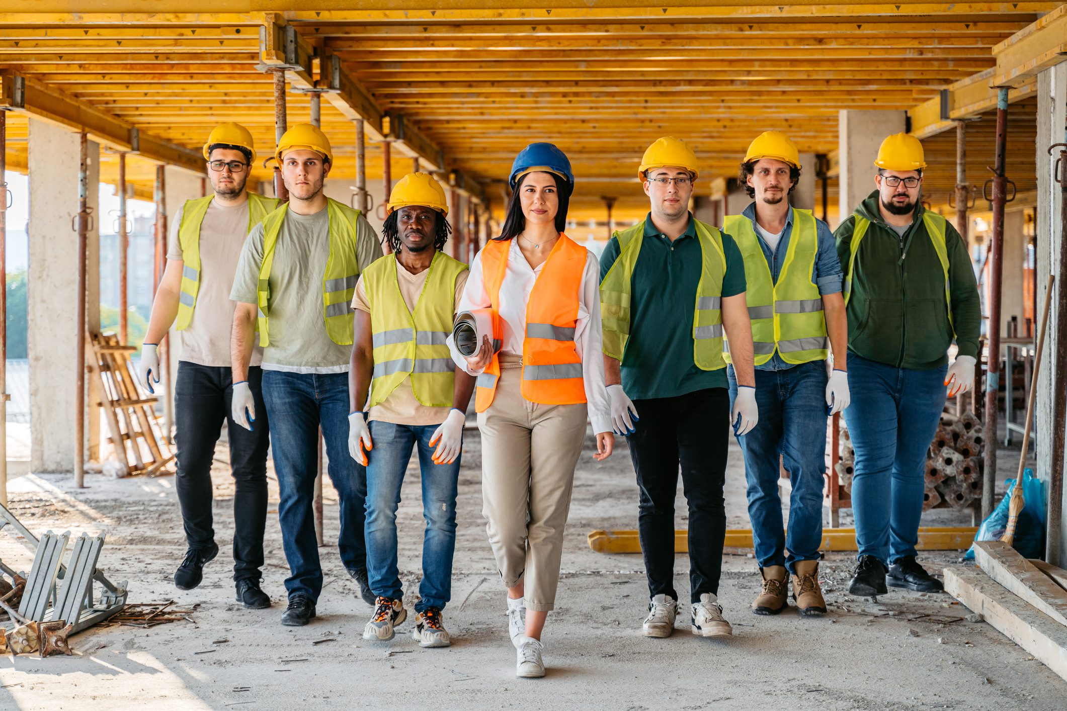 Group of builders at construction location