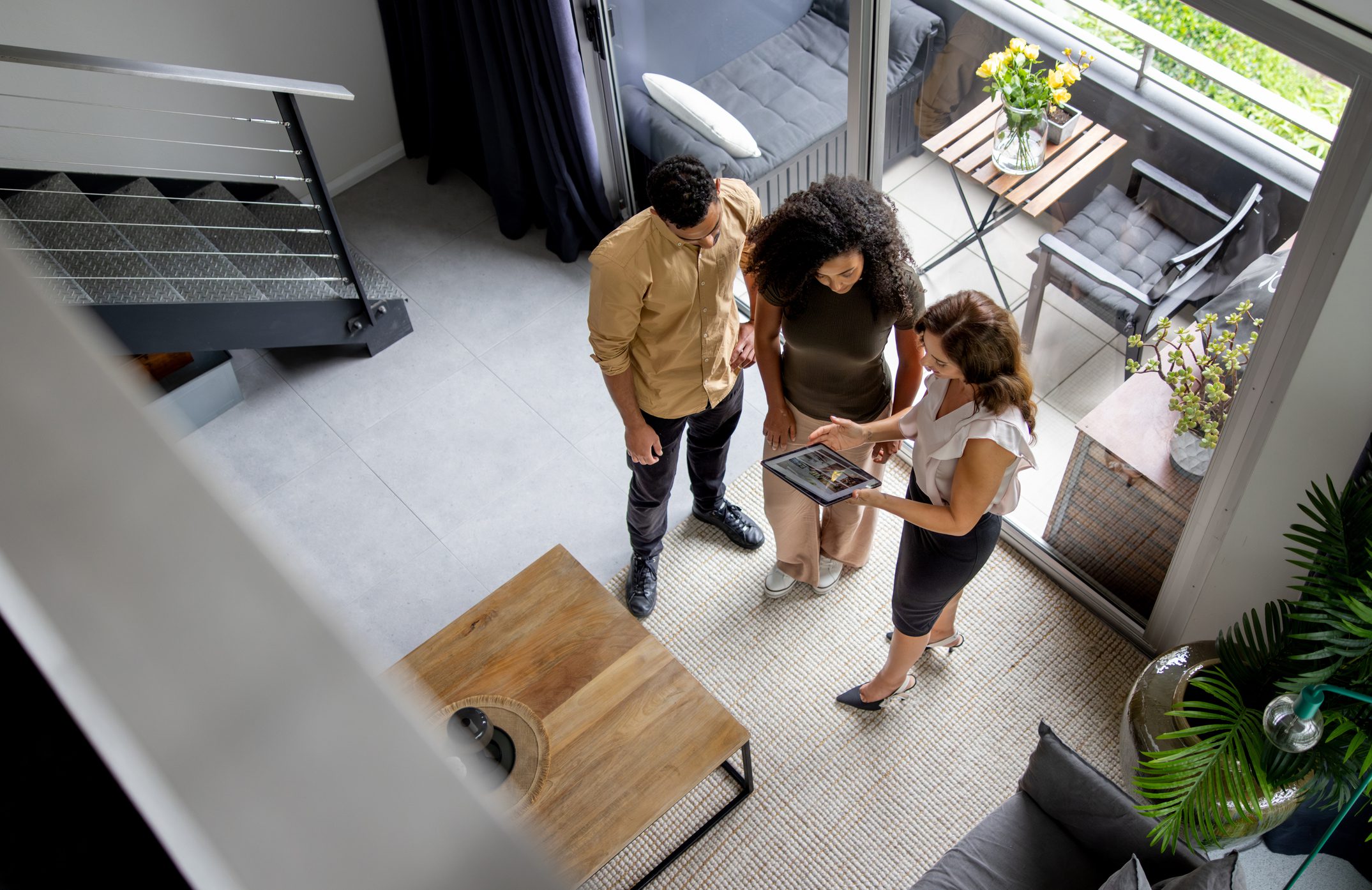 Real estate agent showing modern apartment